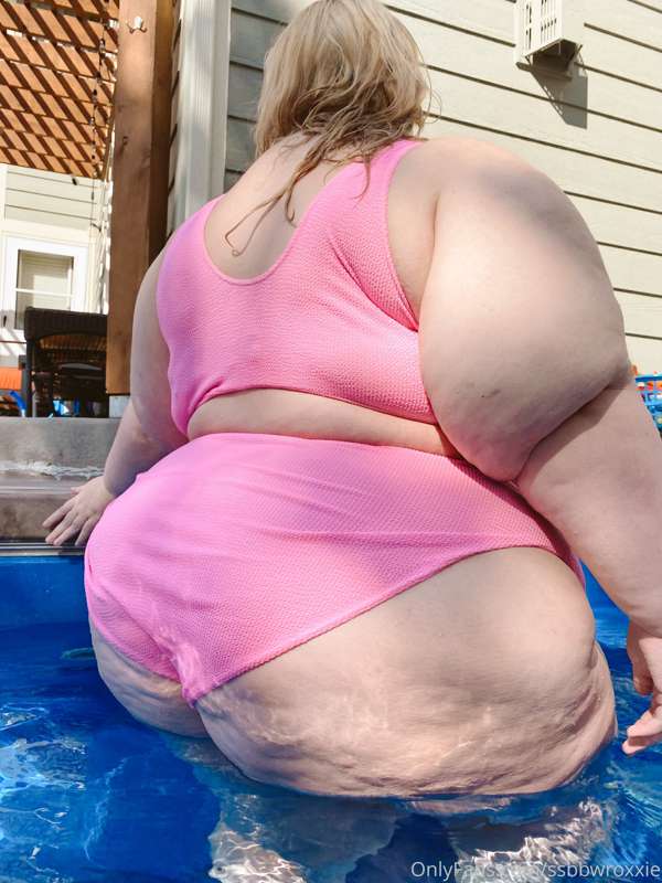 Massive curves in a pink bikini by the pool ☀️ 13