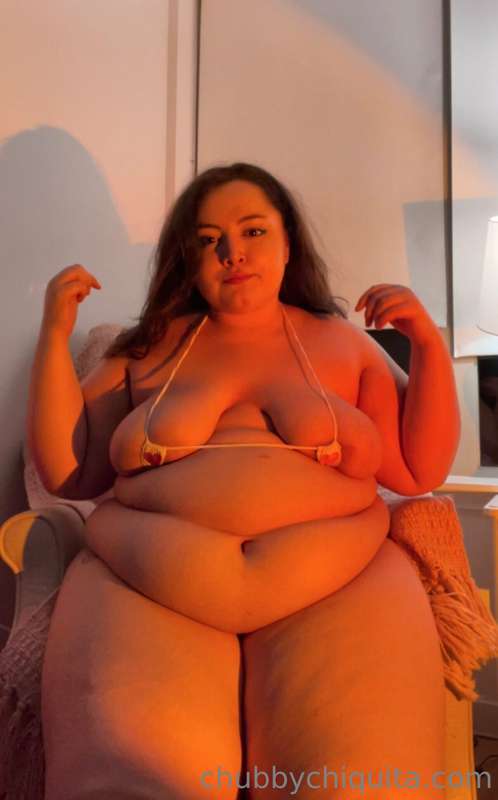 this tiny bikini really doesn't leave much to the imaginatio.. 2