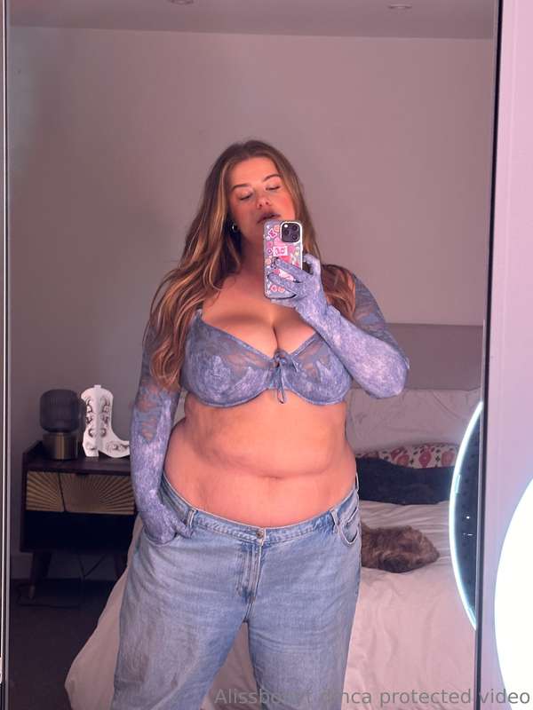 Low rise baggy jeans really hide the biggest and softest par..