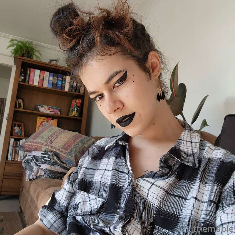 I should do some more picture sets in black liptstick hehe 1