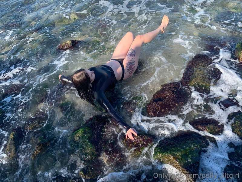 relaxing by the ocean like a true little mermaid 🌊