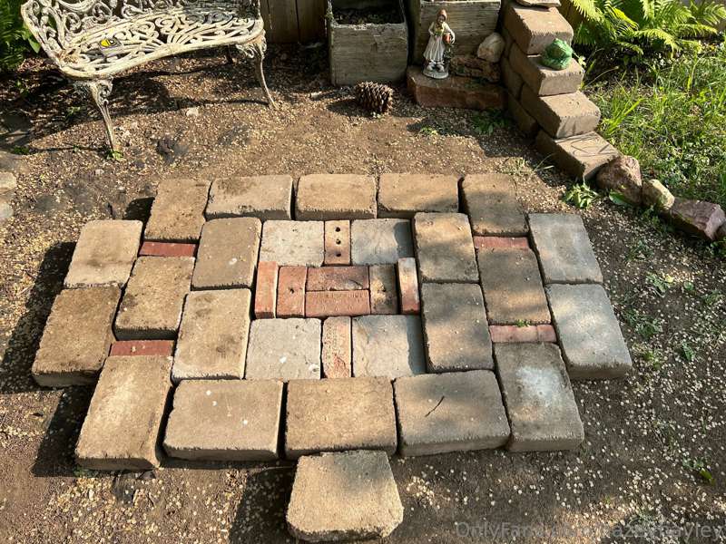 I’ve been lifting these pavers all week to make a cute littl..