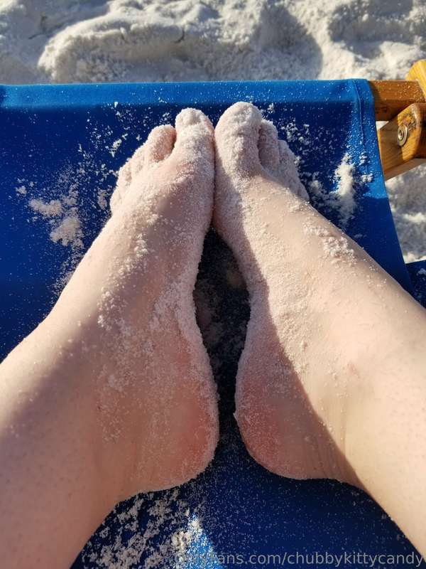 Sandy feet.