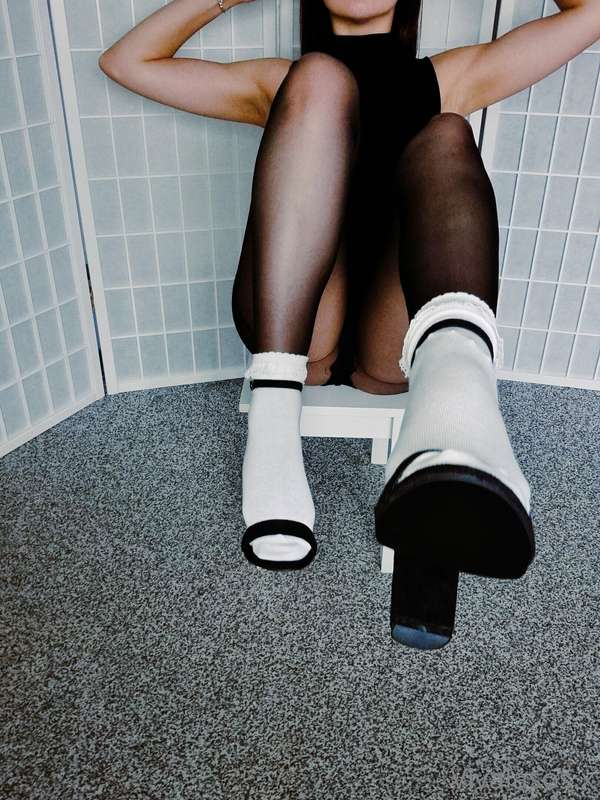 Layers on layers...
High heels, white frill socks and some b.. 10
