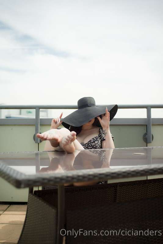 Relaxing in the sun in my new suicidegirls set. Currently in..