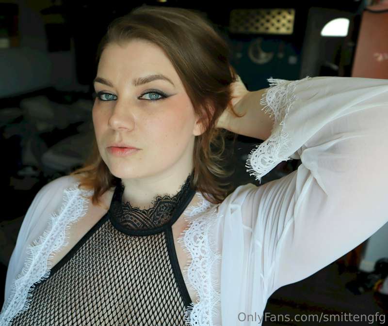 The fabric of the lingerie is braided and beaded and while y.. 12