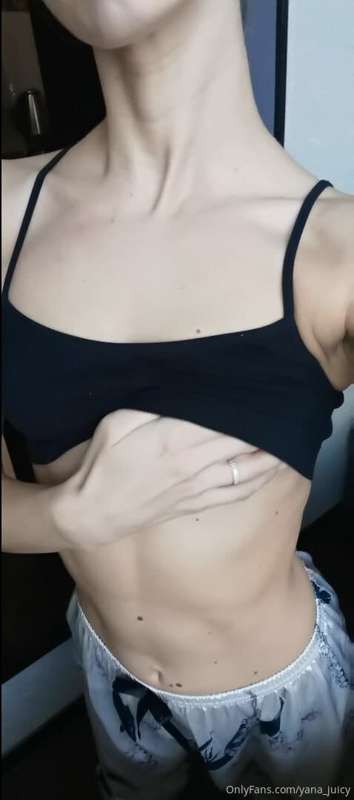 I am now in front of the camera and put my hand in T-shirt a..