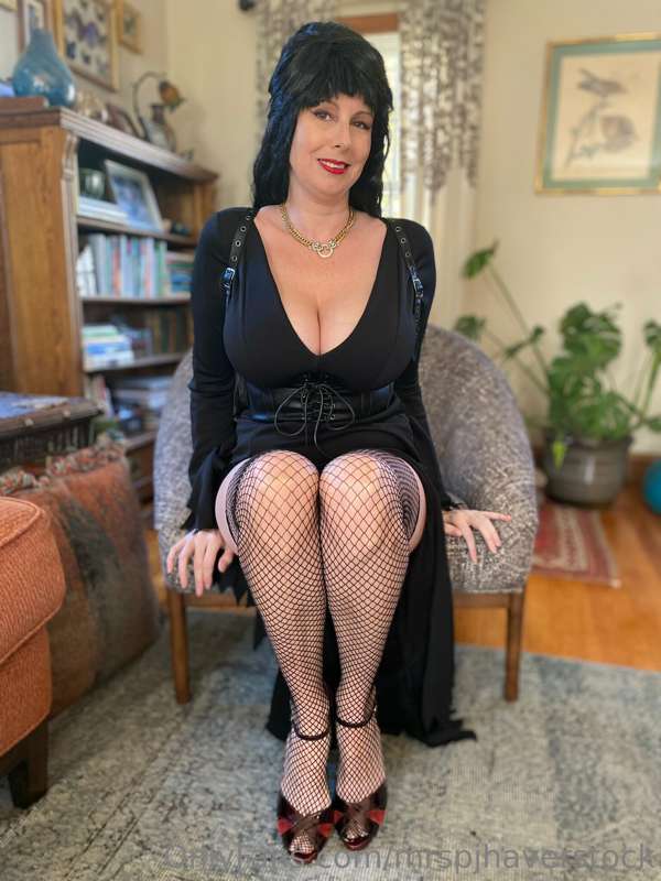 Mistress of the Dark giving a little peek…