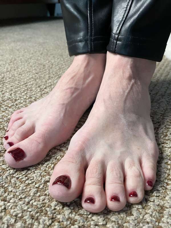 The bold red polish pops against my fair skin, creating a st.. 1