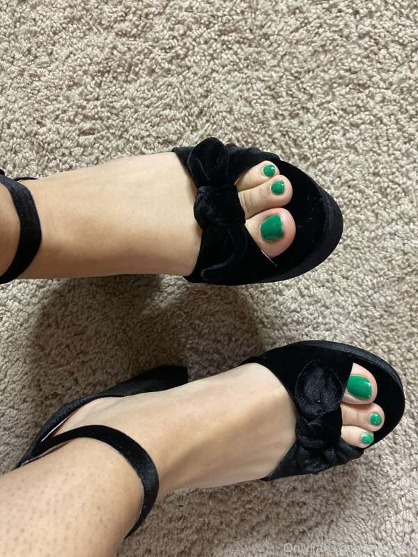 Green painted toes with some nice high heels with my cute pu..