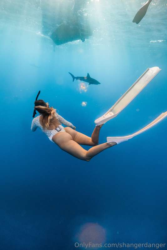 BRITT out in 400 ft of water swimming with SHARKS!!! I heard..