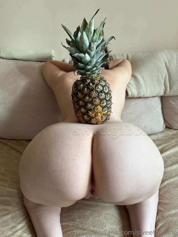 Pineapple on a peach - that's a fruit salad in the making! 🍍..