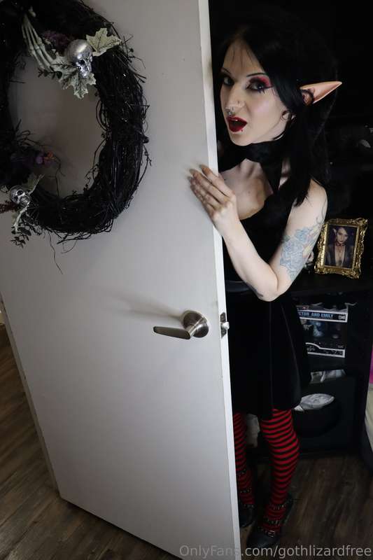 This little elf thought hiding behind the door would be a sm..
