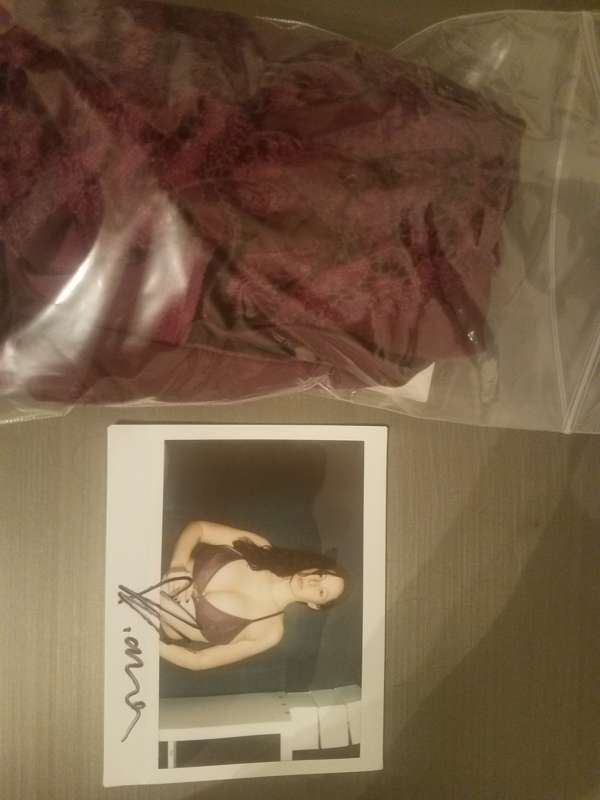 Burgundy  bra.
https://www.mysexyauctions.com/model/gianna-m..