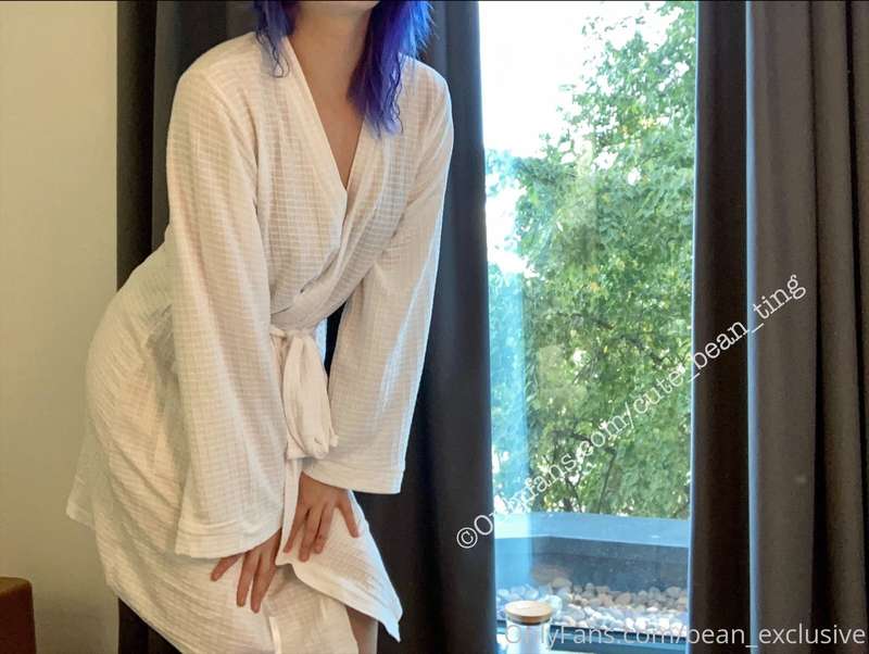 Undo the robe, and open it up, to reveal a perfect pair of s.. 2