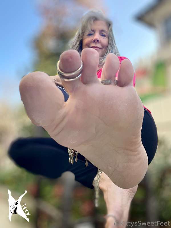 Embracing the perfect fall day—kicked off my shoes to feel t.. 1
