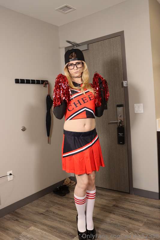 Here are 4 pictures of me in my new cheerleader outfit 🥰