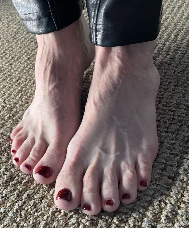 The bold red polish pops against my fair skin, creating a st.. 6