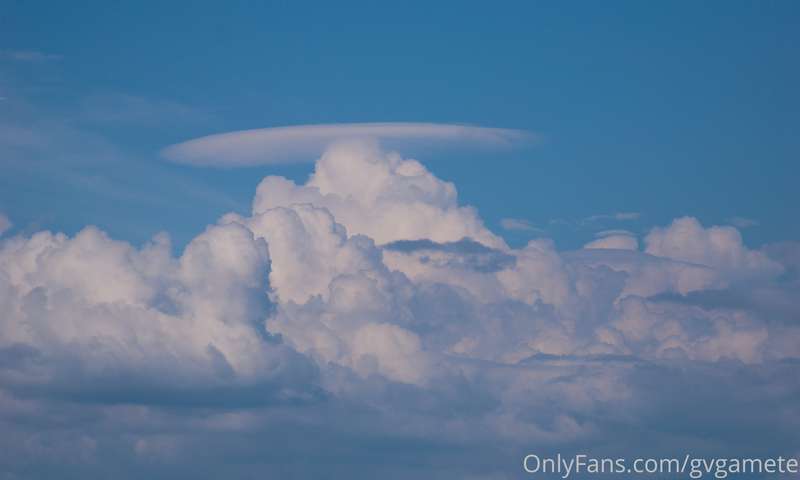 Pileus cloud atop a cumulus cloud. Boston harbor, August 201..