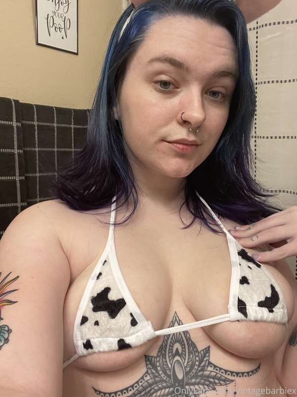 trying to get my giant areolas to stay in this microkini was..