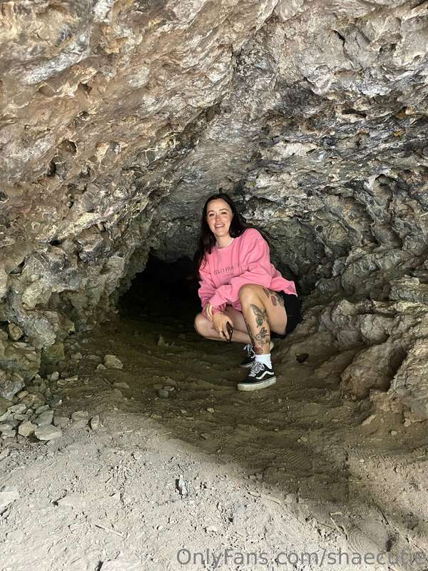 Exploring a cave and paddle boarding on a lake