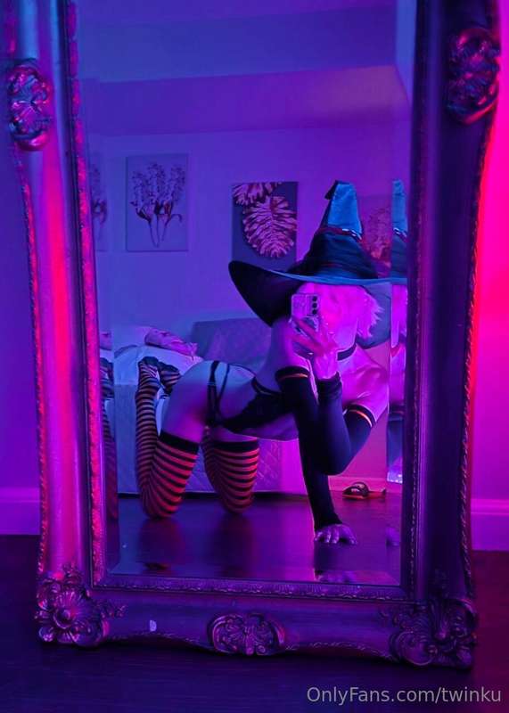 Fangs out, curves on point. Ready to slay this Halloween wit.. 2
