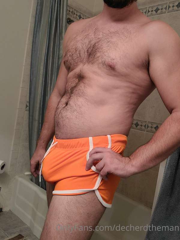 Little orange shorts.