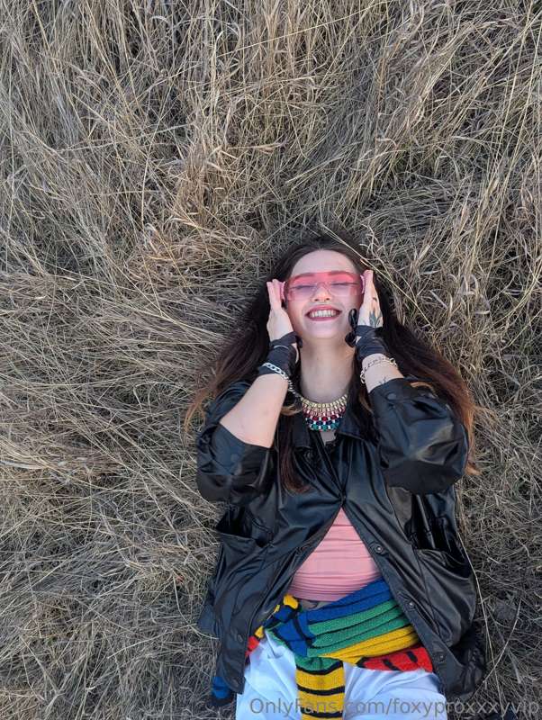 Happiness is lying in the grass, feeling the sun on my skin,..