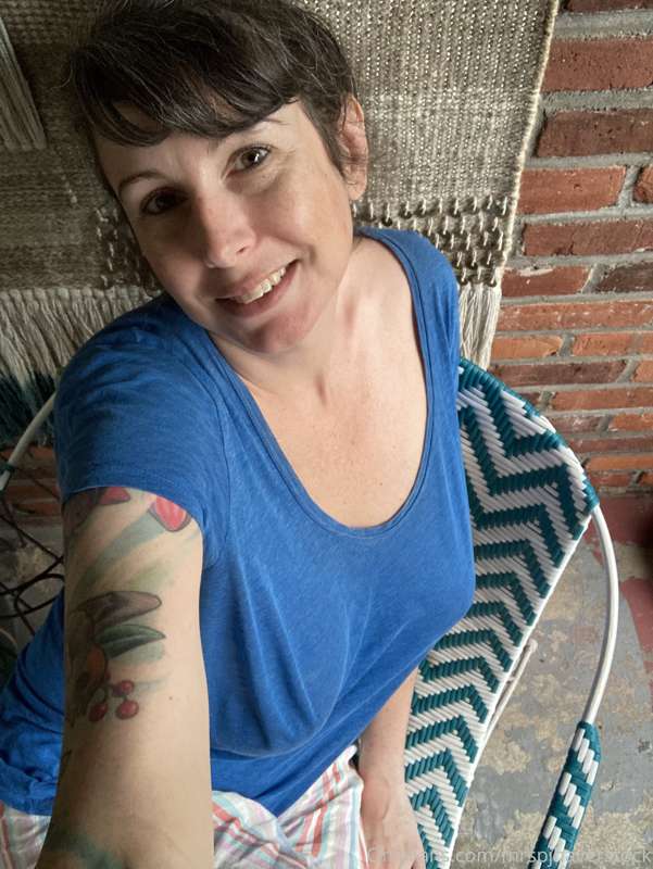 Out on the porch before the storm rolls in… already raining ..