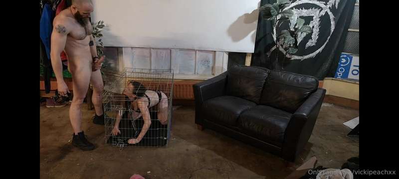 In a cage being a dirty Lil slut