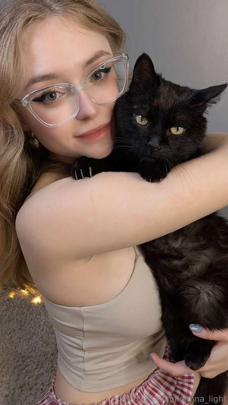 Morning mood = coffee, cuddles, and my little purring shadow..
