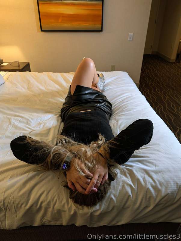 Of all the places to pose, the bed feels the most naughty of..