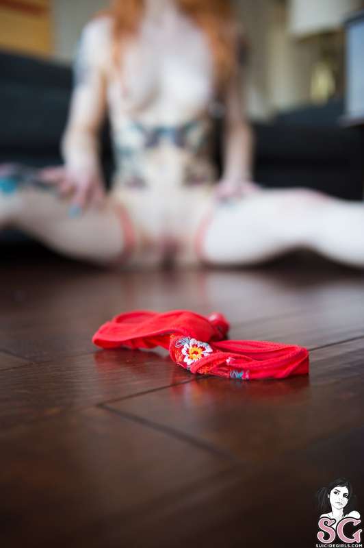 Embrace the wild side with @lovelesssuicide in her throw bac.. 8