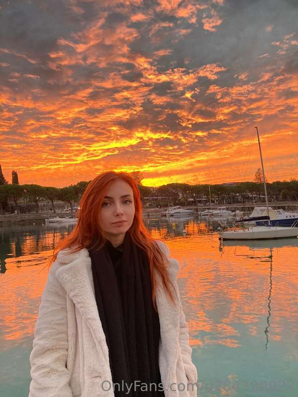 The romance of the sunset envelops this moment with magic, a..
