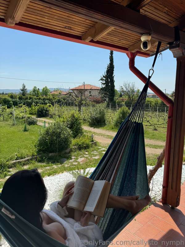 Wrapped in sunshine, lost in pages 🌿📖This book’s a slow burn..