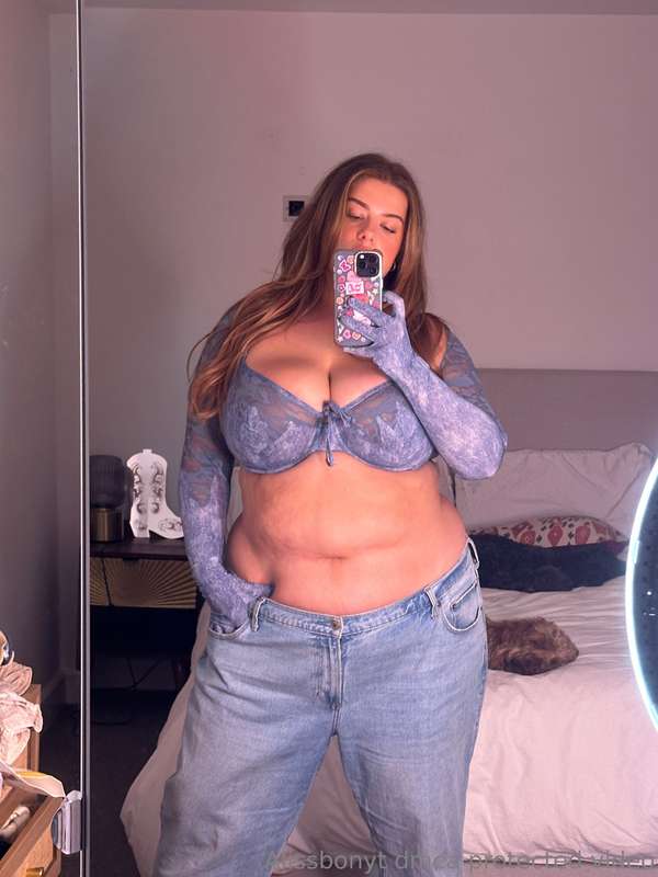 Low rise baggy jeans really hide the biggest and softest par.. 3