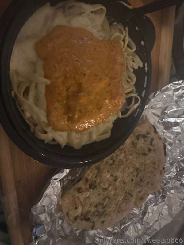 My fatass saw a TikTok of someone putting butter chicken ont.. 1