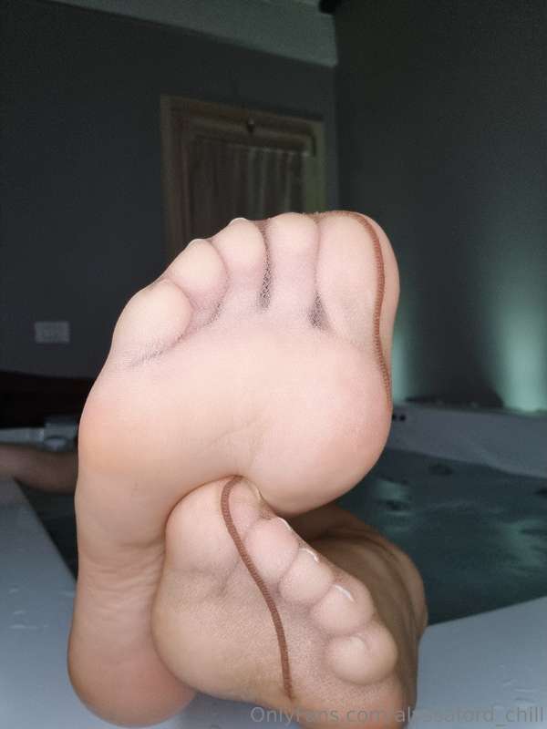 in the hot tub in a nylon dress and nylon stockings  4