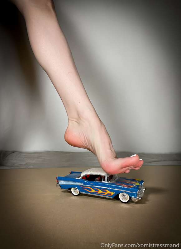 I got to crush a tiny little car with my feet for a custom v..
