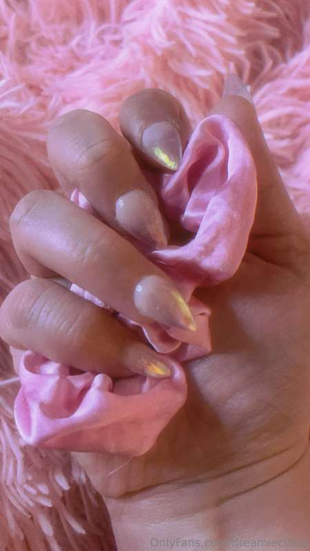 A mini set of my manicured hand wrapped around my play partn..