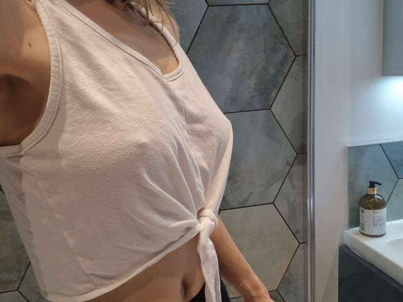 A timeless combination of a crisp white vest and an invigora.. 2
