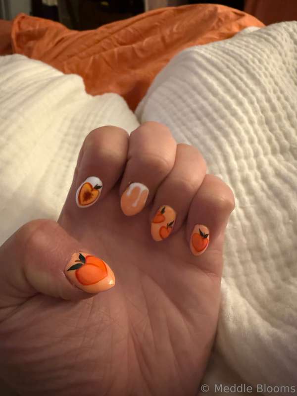 Just got home from modest mouse! And I got peach nails!!! 🥰🥰.. 1