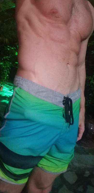 Vacation dick pics through my swim trunks! 1