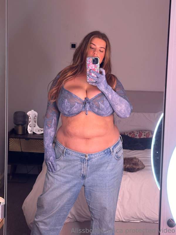 Low rise baggy jeans really hide the biggest and softest par.. 1