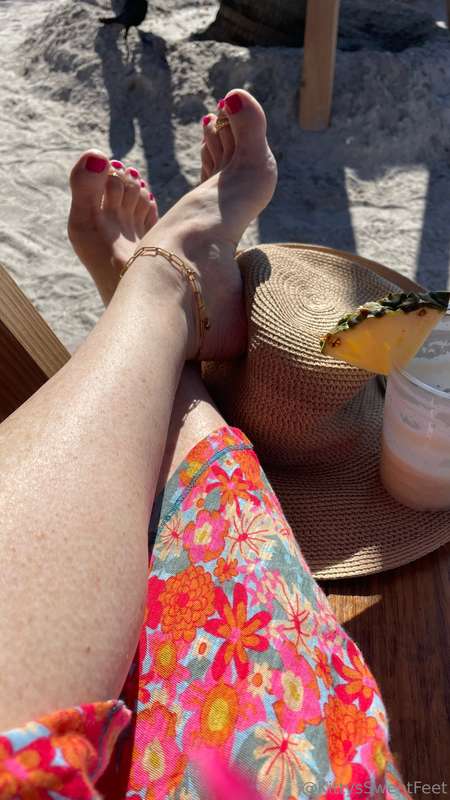 Soaking up the sun at St. Pete Beach, Florida—piña colada in.. 4