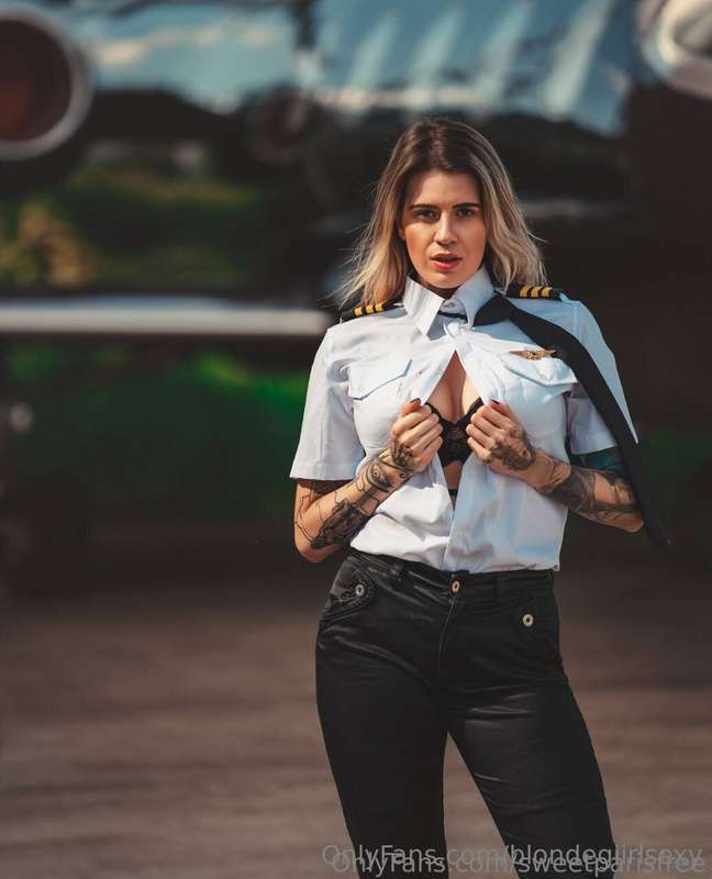 ** ✈️ This hot pilot👩🏼‍✈️is ready to taken off! Jump on boar..
