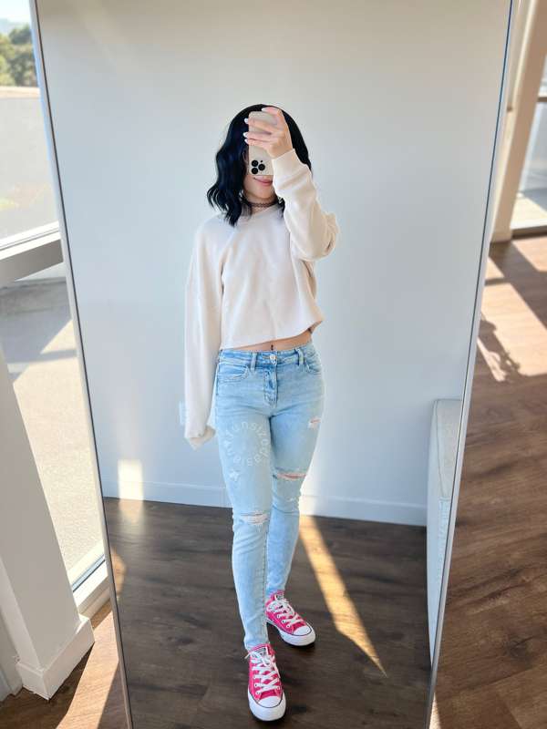 Just an average girl wearing an everyday outfit... Nothing t.. 9