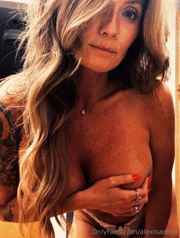 Having you sucking on my big titties will get me so turned o..