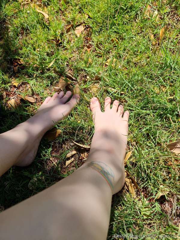 Barefoot in the grass enjoying the sun shine 😍 10