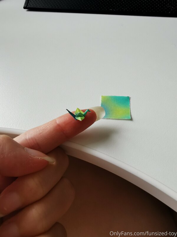 Any origami fans here :D? I love making tiny paper cranes. 2